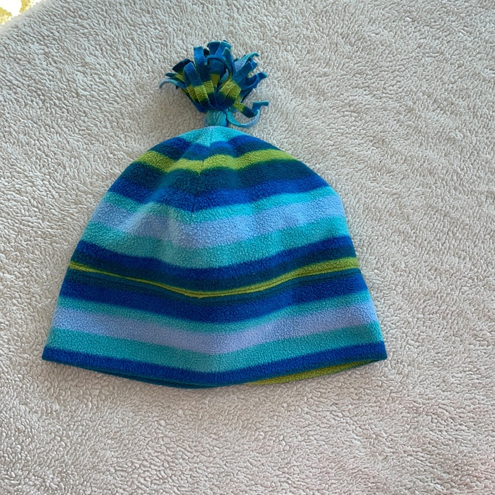 Beanie with Tassle with bright blue, green, and lime colors OS